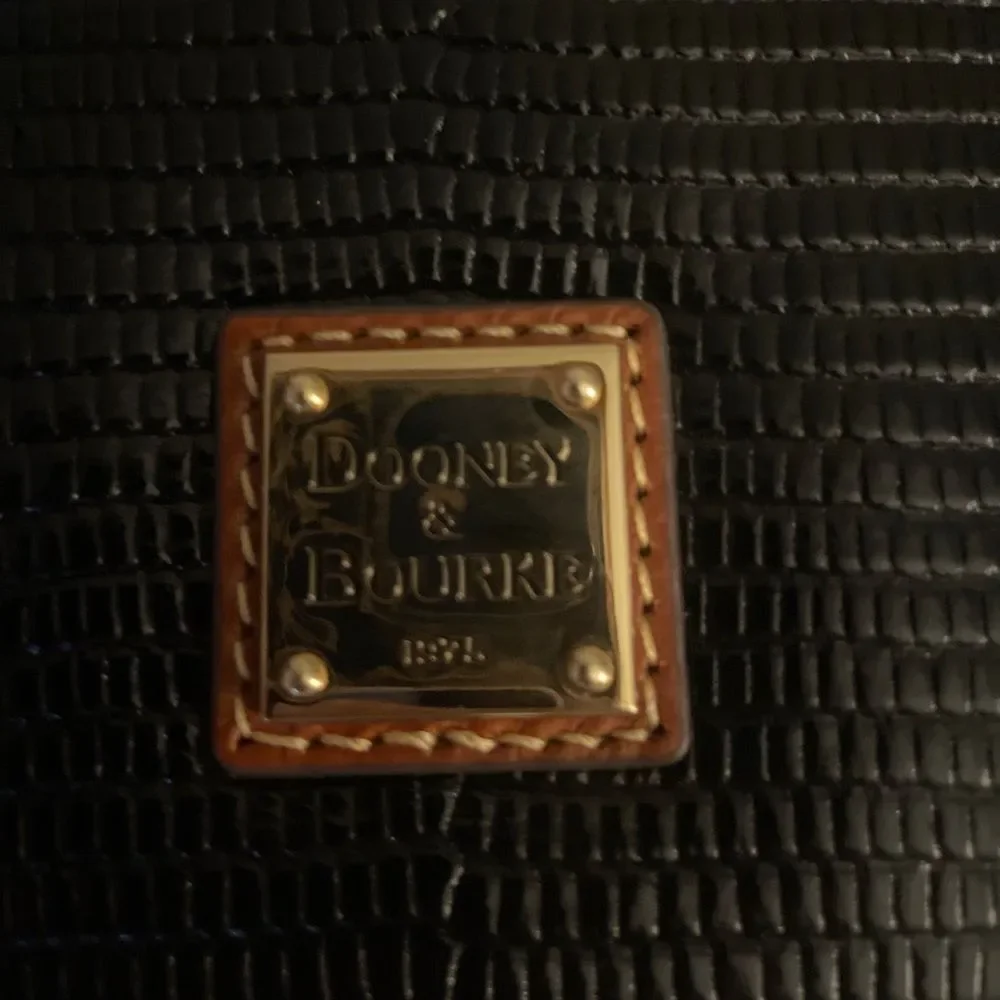 Dooney & Bourke questions leave